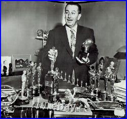 1954 Press Photo Animator Walt Disney Poses with All of His Oscar Awards