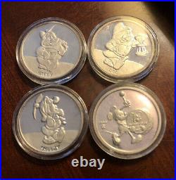 Lot Of (4) Vintage Walt Disney 1 Oz. 999 Silver Rounds Mickey Mouse Seven Dwarfs