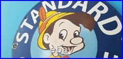 Vintage Standard Gasoline Porcelain Gas Pinocchio Walt Disney Service Pump Sign