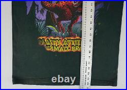 Vintage Walt Disney Countdown to Extinction shirt tagged small faded Dinosaur